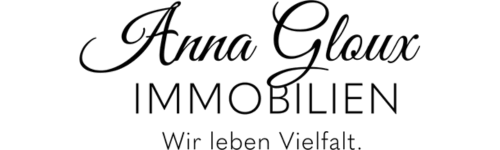 Logo von Anna Gloux Immobilien mit dem Slogan „Wir leben Vielfalt“ in schwarzer Schrift